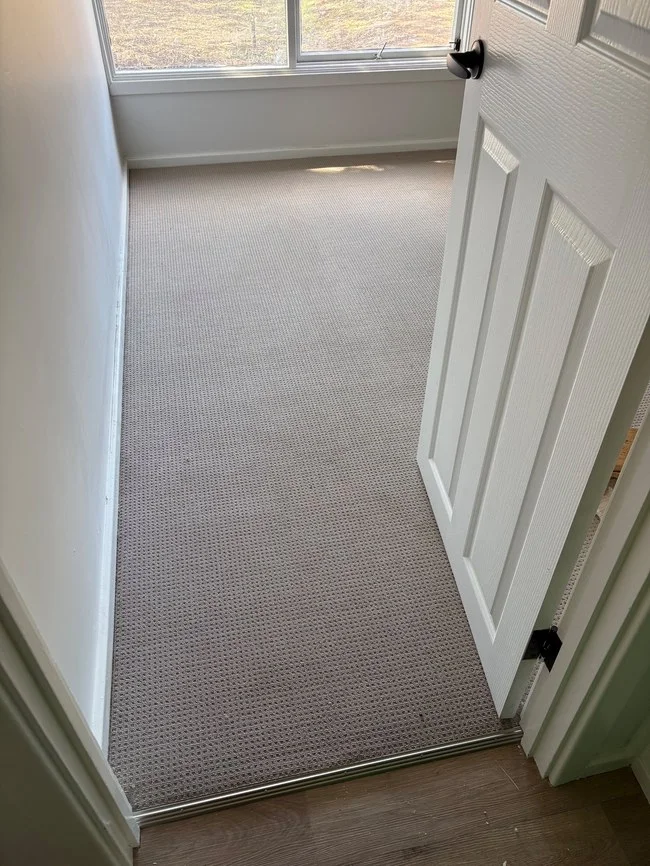 New light grey loop carpet in a Melbourne rental property bedroom